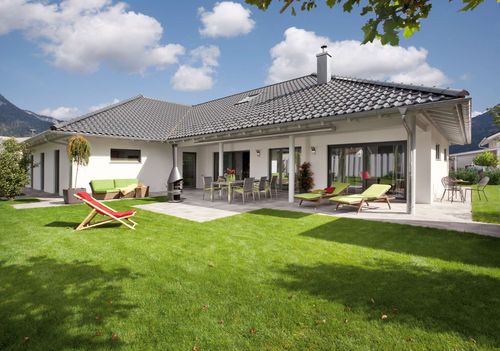 Bungalow in L-Form - Slideshow-Bild 1