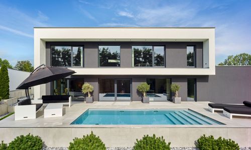 Fertighaus-WEISS-Bauhaus-Haus-Pudellek-Tagansicht.jpg