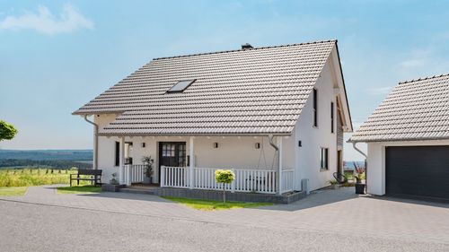 Karesa_Fertighaus_Familie_Satteldachhaus_Erker_Haus_NEubau_Family_Zuhause_aussen_4.jpg