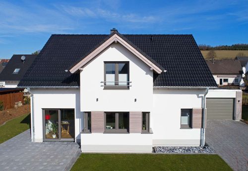 Modernes Haus mit besonderen Holzakzenten - Slideshow-Bild 2