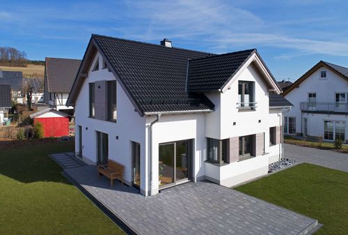 Modernes Haus mit besonderen Holzakzenten - Slideshow-Bild 3